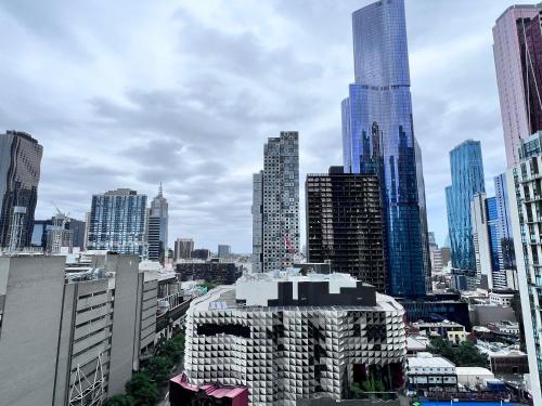 a view of a city with tall buildings at MelbCBD Central NYE Fireworks large 3BR2BTH GymPool in Melbourne