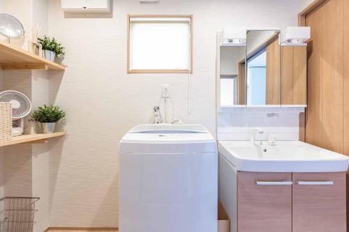 Un baño de PEACE OF REST SHIRAHAMA