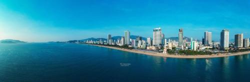 acean view of a city with a beach and buildings at SeaHaven Panorama Nha Trang Superview Apartments in Nha Trang