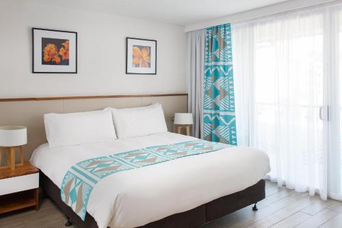 Ένα ή περισσότερα κρεβάτια σε δωμάτιο στο Holiday Inn Suva by IHG