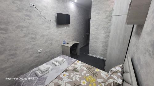 TV a/nebo společenská místnost v ubytování Shahriston Guest House