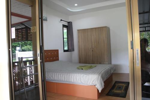 Katil atau katil-katil dalam bilik di Naluemon Village FH 2