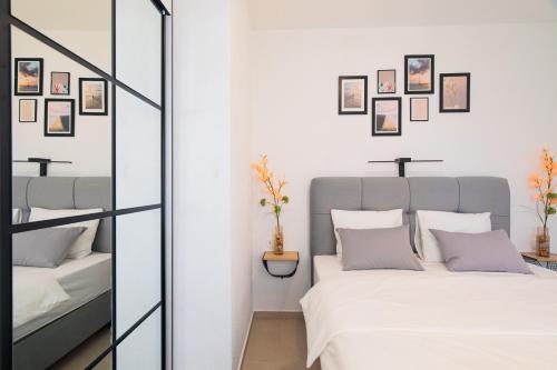 Posteľ alebo postele v izbe v ubytovaní Apartman Mares 2
