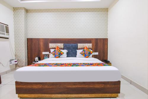Katil atau katil-katil dalam bilik di FabHotel Lime Wood