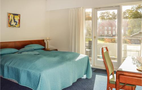 En eller flere senge i et værelse på Nice Apartment In Helsingr With 1 Bedrooms And Wifi