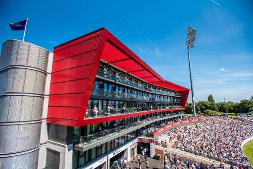 a rendering of a baseball stadium with a large crowd at Hilton Garden Inn Manchester Emirates Old Trafford in Manchester