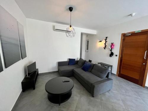 Ein Sitzbereich in der Unterkunft Dreams of Holiday. Apartment with Pool