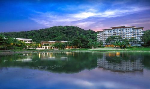 a large body of water in front of a building at Pico De Loro 2BR Carola B Unit with Lagoon View in Nasugbu