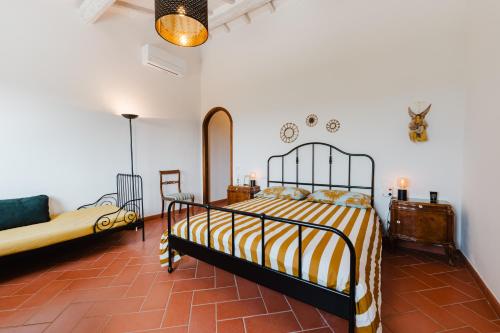 Postel nebo postele na pokoji v ubytování Tognazzi Casa Vacanze - Panoramic Villa