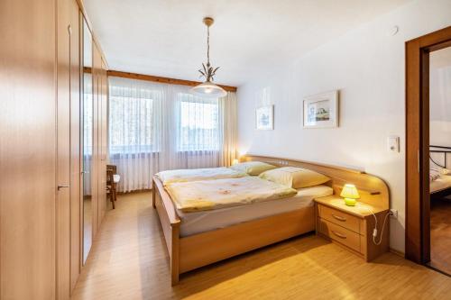 Postel nebo postele na pokoji v ubytování Ferienwohnung im Haus Stöckl