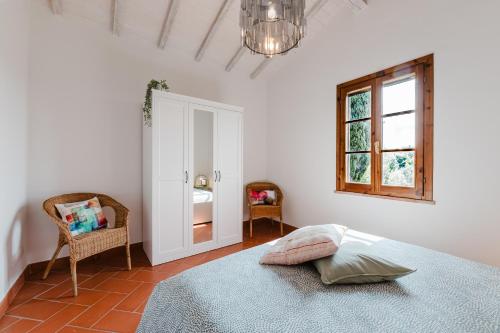 Postel nebo postele na pokoji v ubytování Tognazzi Casa Vacanze - Panoramic Villa