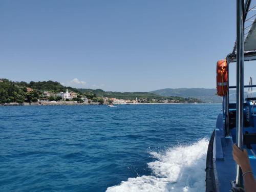 a boat in a large body of water at Nennella Cilento House in Cuccaro Vetere