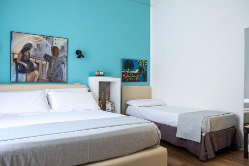 Una cama o camas en una habitación de Ai Vicerè