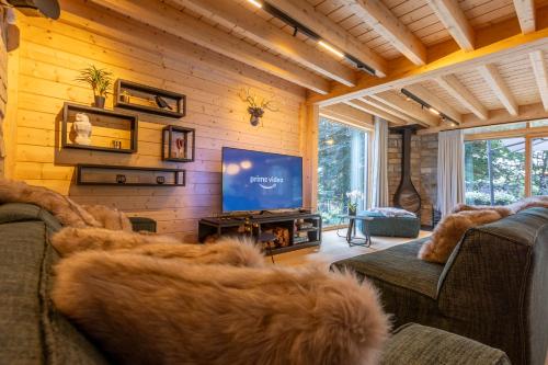 Zona de estar de Villa Wood - Gîte de prestige en Ardennes - 10 personnes - Sauna, jacuzzi, piscine et billard
