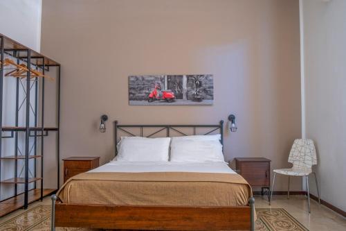 Una cama o camas en una habitación de Ai Vicerè