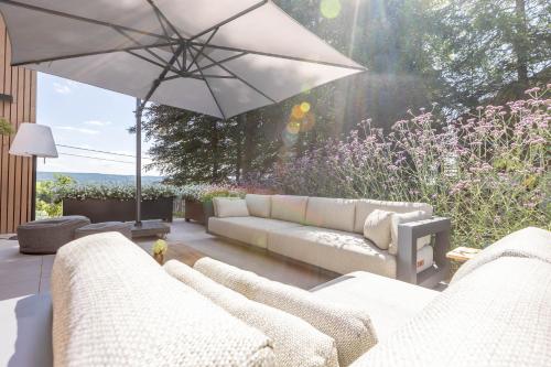 Zona de estar de Villa Wood - Gîte de prestige en Ardennes - 10 personnes - Sauna, jacuzzi, piscine et billard