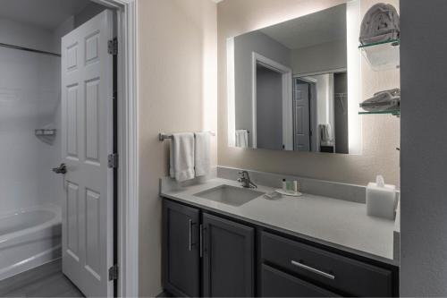 a bathroom with a sink and a mirror at Residence Inn Columbus Easton in Columbus