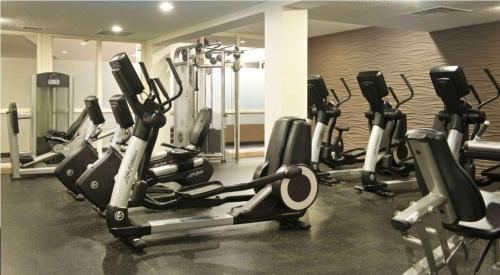 a gym with a bunch of exercise bikes in it at DoubleTree by Hilton Bloomington Minneapolis South in Bloomington