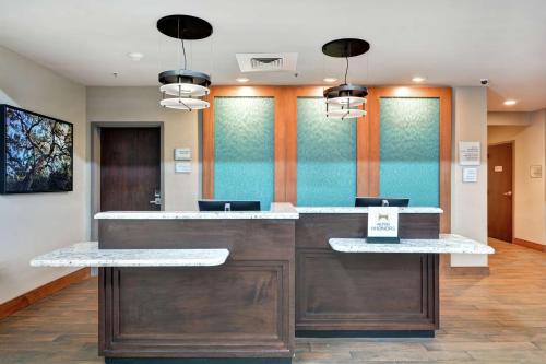 a lobby with a reception desk in a office at Homewood Suites TechRidge Parmer @ I-35 in Austin