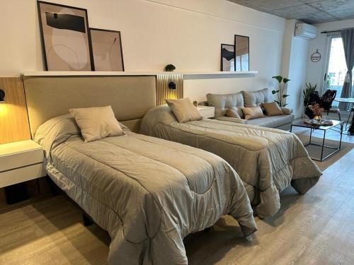 Кровать или кровати в номере Palermo Soho Boutique Apartment in Maison Thames