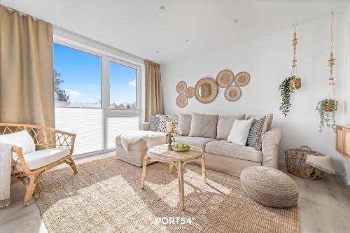 Χώρος καθιστικού στο Modernes Ferienhaus "Meerliebe" mit direktem Meerblick an der Ostsee
