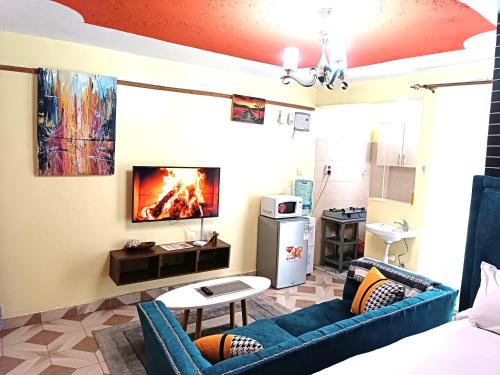 Ein Sitzbereich in der Unterkunft Cosy Studio Apartment,TRM Drive, Nairobi