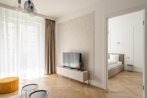 Кровать или кровати в номере RentPlanet - Przedmieście Oławskie