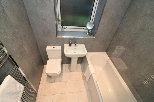 Een badkamer bij Signature - Carrick View