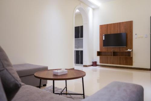 A television and/or entertainment centre at ايار للشقق المخدومه