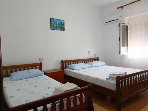 Alti Holiday Apartments ONEにあるベッド
