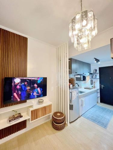 Kuchyň nebo kuchyňský kout v ubytování JA2 STAYCATION @TREES RESIDENCES