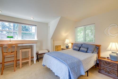 A bed or beds in a room at Charming Indianola Home Walk to Town!