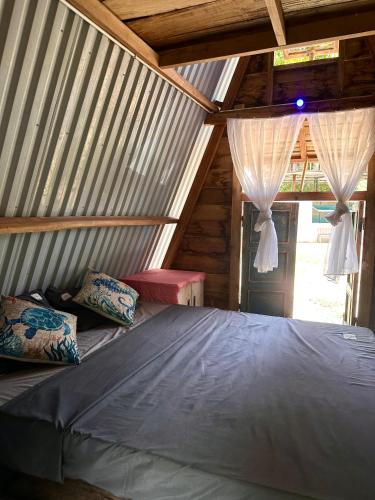 Postel nebo postele na pokoji v ubytování Homie Hava Homestay