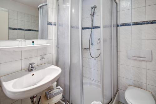 Koupelna v ubytování Hotel Leander