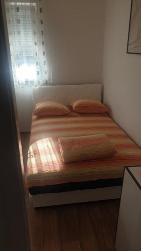 Postel nebo postele na pokoji v ubytování Apartman Borko 2-1