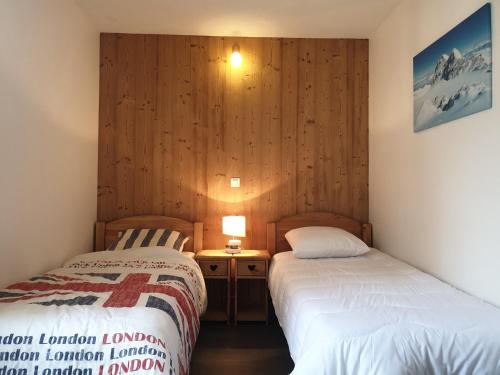Cama ou camas em um quarto em Olympic Appartements VTI