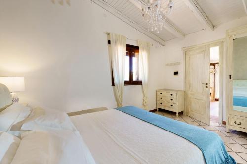 Posteľ alebo postele v izbe v ubytovaní Villa del Mito