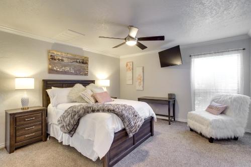 a bedroom with a bed and a ceiling fan at Norman Vacation Rental Less Than 1 Mi to University! in Norman