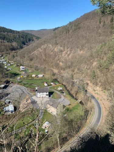 an aerial view of a village in the mountains at Hotel Forsthaus in Volkesfeld