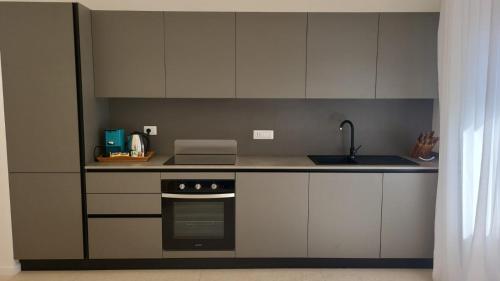 Una cocina o zona de cocina en Vesuvio View Apartment