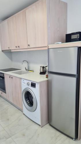 Una cocina o zona de cocina en Elite Residence