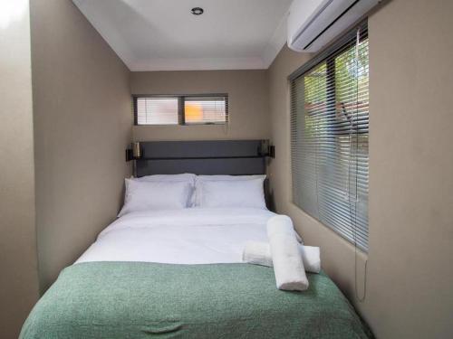 Säng eller sängar i ett rum på @ 21 Guest House
