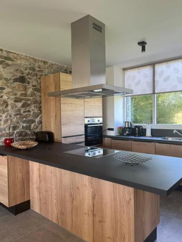 Una cocina o cocineta en Le Refuge de Toine Gîte rural 3 épis