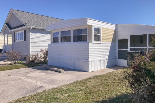 a white house with a driveway in front of it at Montego Bay - Atlantic 13300 in Ocean City