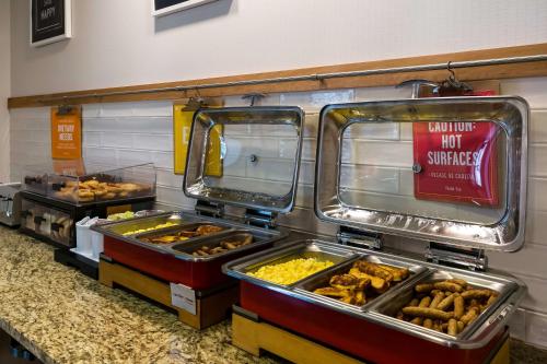 a food cart with many different types of food at Hampton Inn & Suites Wilmington Christiana in Newark