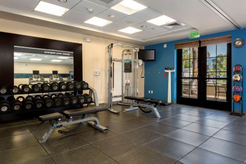 a gym with two treadmills and weights at Hampton Inn Santa Barbara/Goleta in Santa Barbara