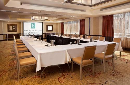 a large conference room with a long table and chairs at Embassy Suites by Hilton Washington DC Chevy Chase Pavilion in Washington