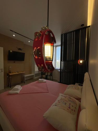 Una cama o camas en una habitación de apartamente Melodi