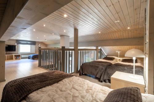 Postel nebo postele na pokoji v ubytování Villa Peso1 - 8 henkilölle, HimosYkkösen alue, 70m²+40m²