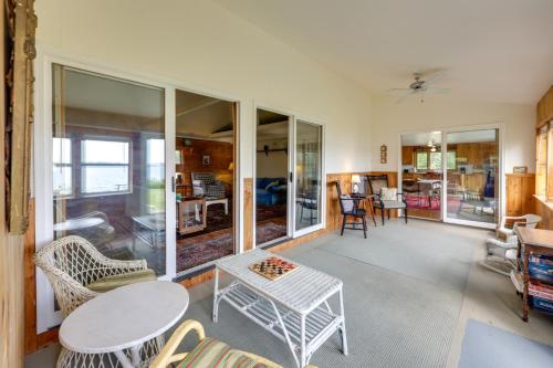 a living room with a table and chairs at Shorefront House with Views, 14 Mi to Acadia NP in Sullivan